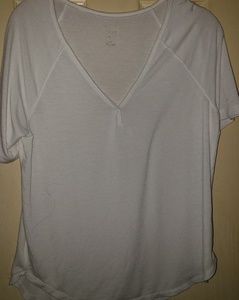 White extremely soft top nwot flounce shirt